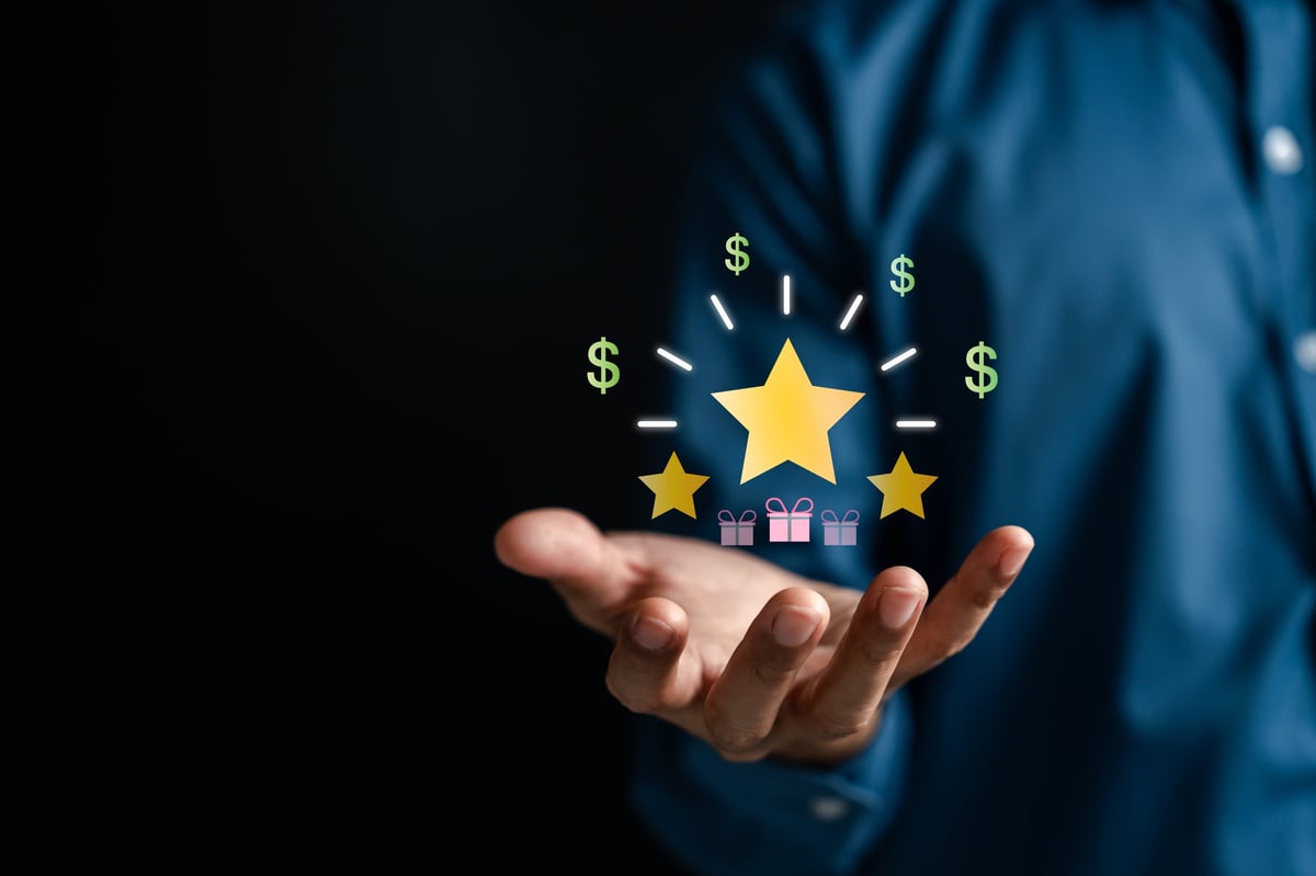 Loyalty rewards program — gold star, gift box, and dollar sign representing A-Luxe membership perks